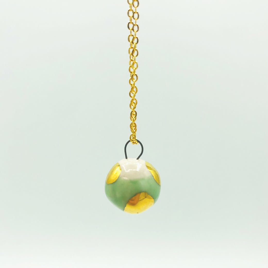 Ceramic pendant - Stone with aqua green and gold sphere