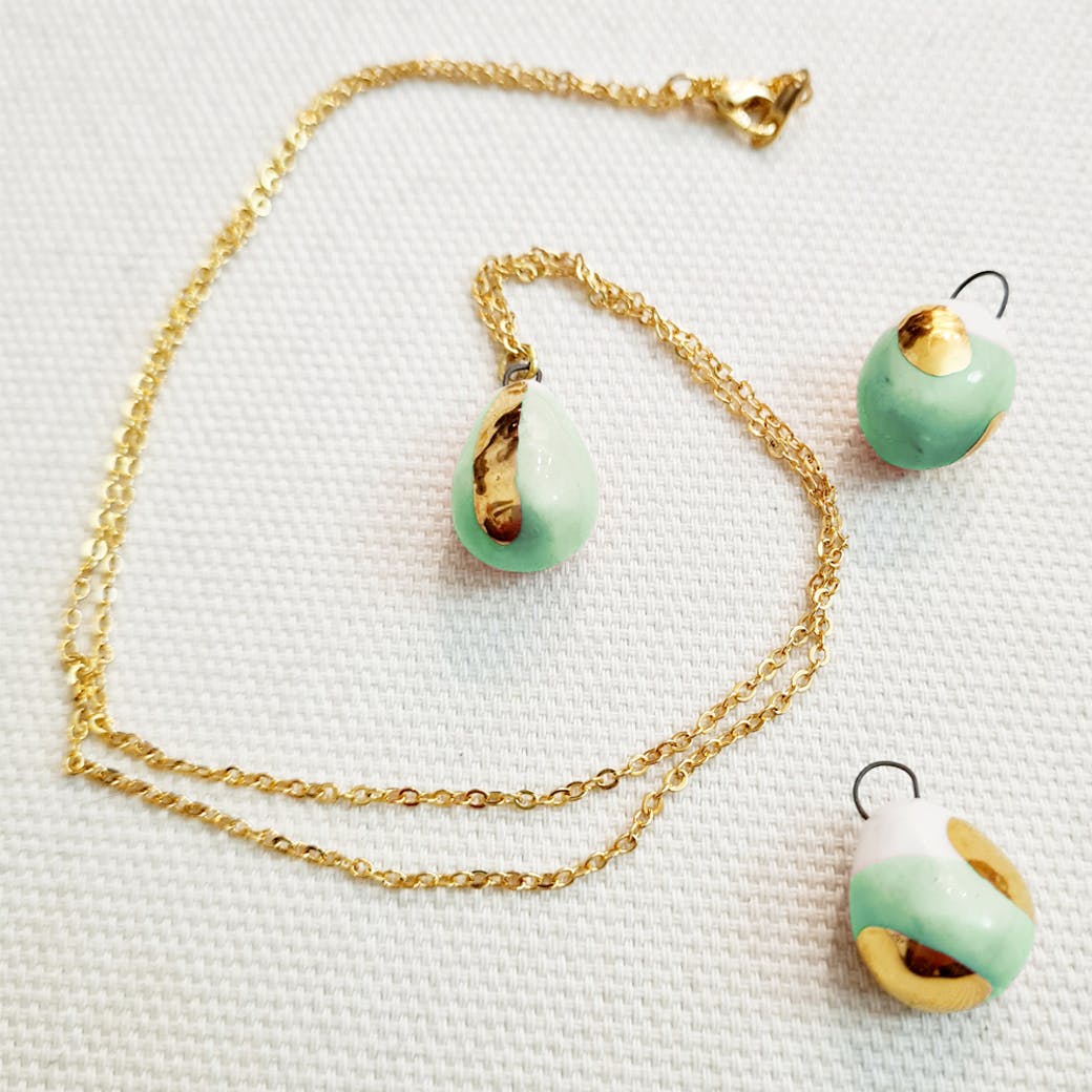 Ceramic pendant - Stone with aqua green and gold sphere