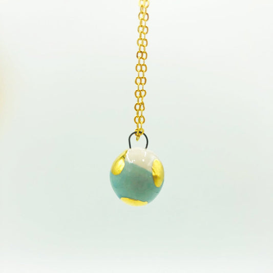 Ceramic pendant - Stone with petrol and gold sphere